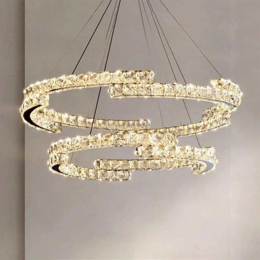 Függesztett LED-es csillár távirányítóval és kristály MIA LATIFAH 55W, 2 kör, hideg/meleg/semleges fény, szabályozható, fényes króm, állítható magasságú LED csillárok távirányítóval Alapértelmezett cím Alessandro Design
