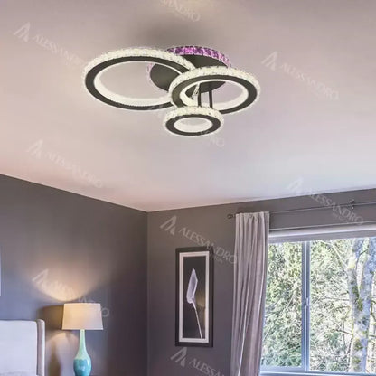 LED csillár távirányítóval és kristály LEOCADIA RGB 134W, 3 kör, hideg/meleg/semleges fény, szabályozható, fekete kristály LED csillárok Alapértelmezett cím Alessandro Design